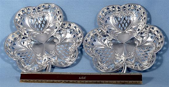 A pair of Edwardian silver “shamrock” sweetmeat dishes,